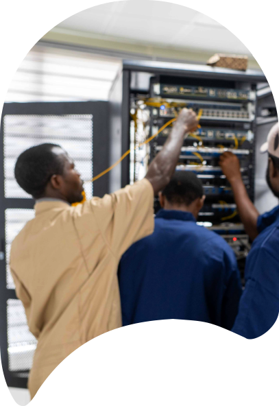 men checking network cables in server